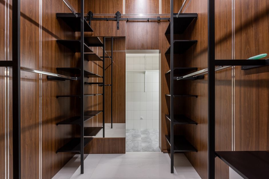 Wooden closet shelves and organizational spaces