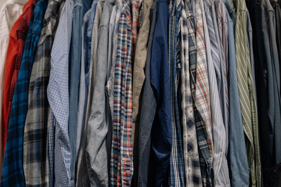 Shirts hanging neatly in a custom wardrobe